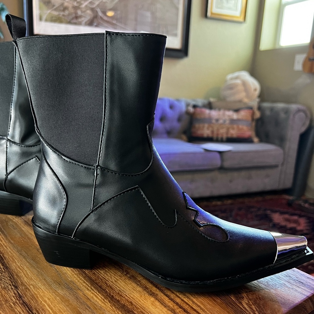 Black boot with metal tipped toe